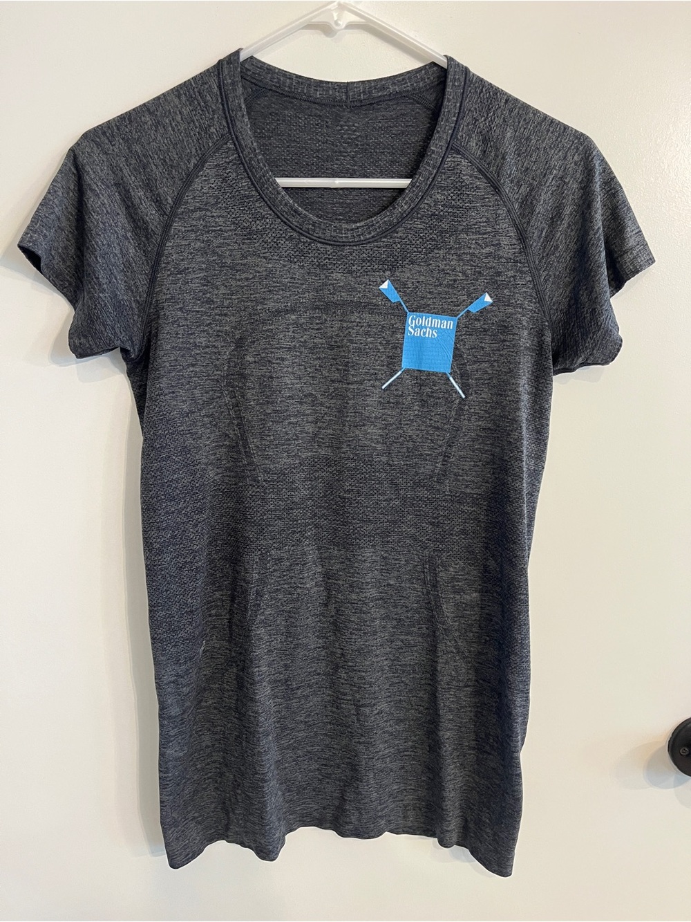 Women’s size 8 Lululemon Goldman Sachs tee shirt